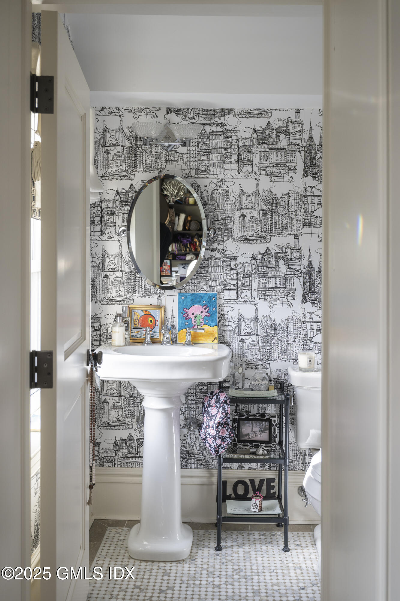 50 Sound View Drive, Unit 2N Greenwich, CT 06830 - Photo 23 of 37 a bathroom with a sink and a mirror