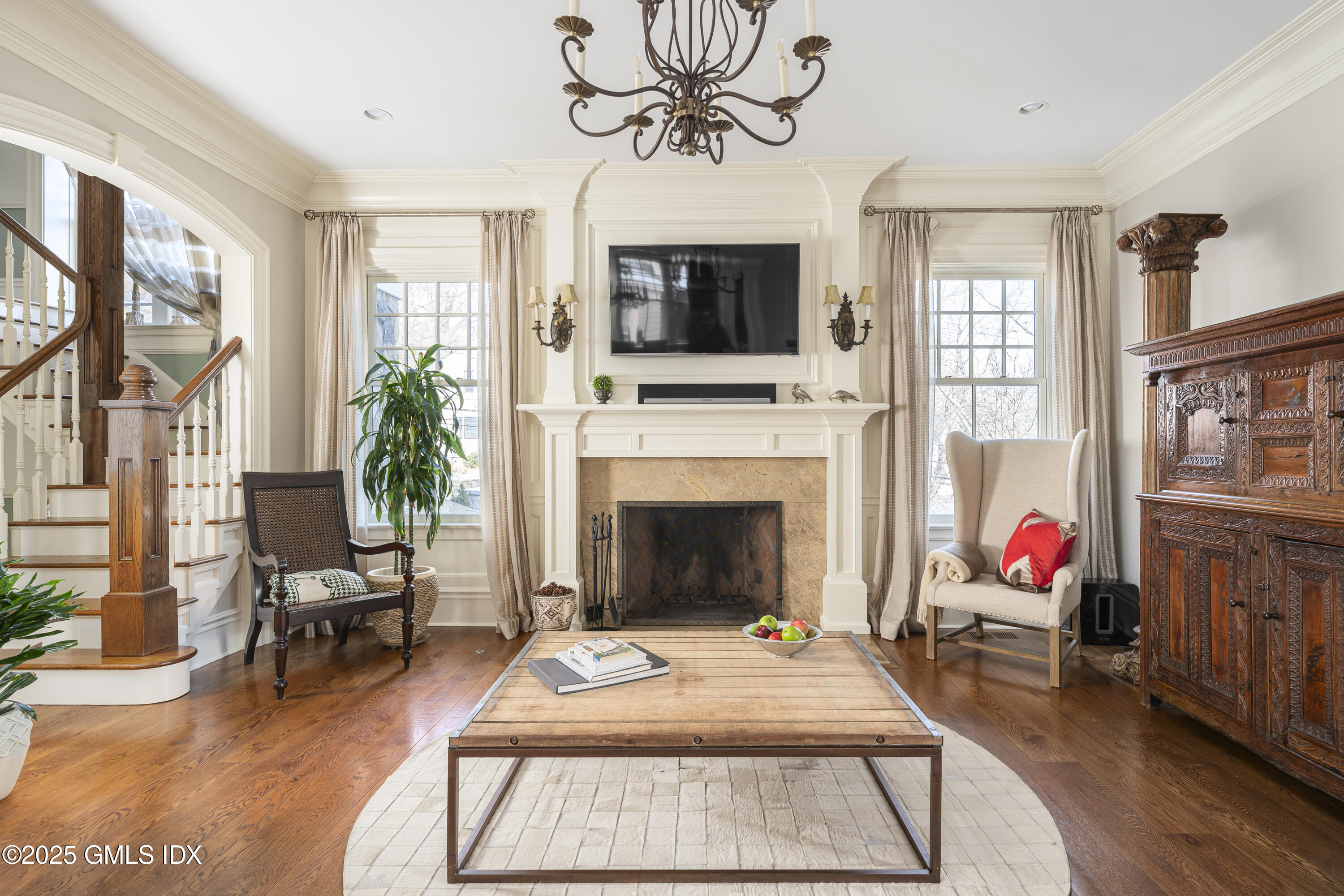 50 Sound View Drive, Unit 2N Greenwich, CT 06830 - Photo 10 of 37 a living room with furniture fireplace and flat screen tv