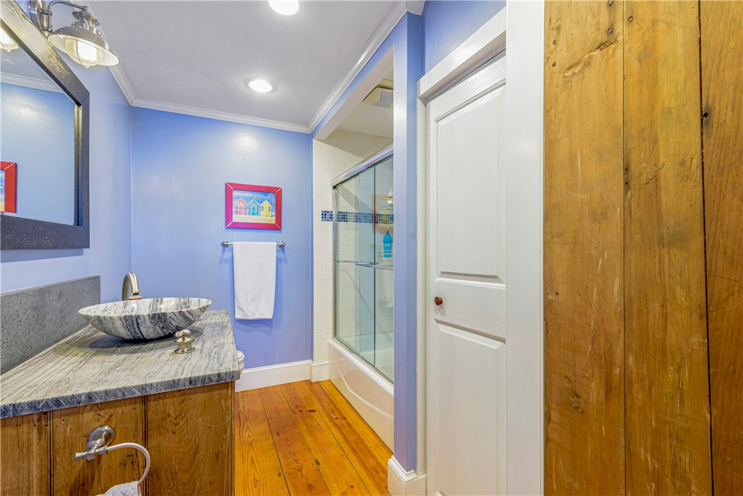 36 Post Road Warwick, RI 02888 - Photo 11 of 23 First floor bath and laundry.