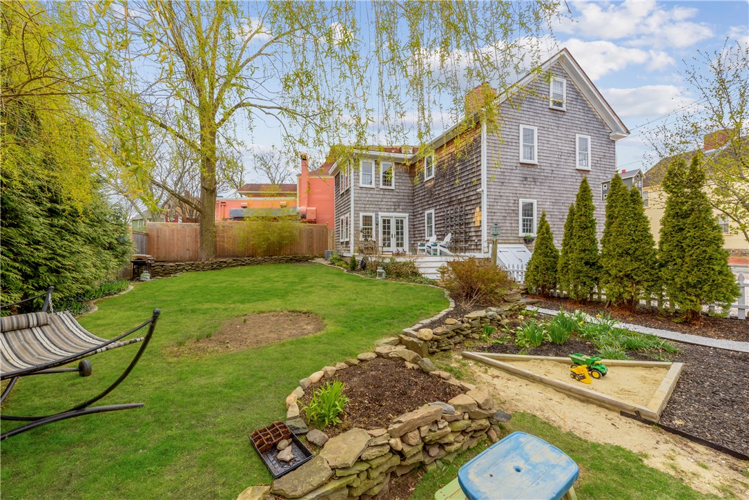 36 Post Road Warwick, RI 02888 - Photo 2 of 23 Privacy abounds in the backyard.
