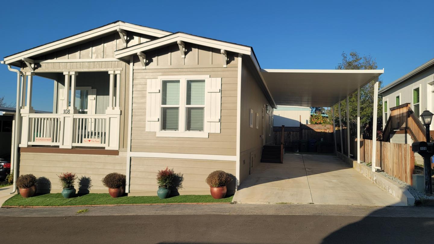 100 North Rodeo Gulch Road, Unit 108 Soquel, CA 95073 - Photo 11 of 16 a front view of a house with a yard