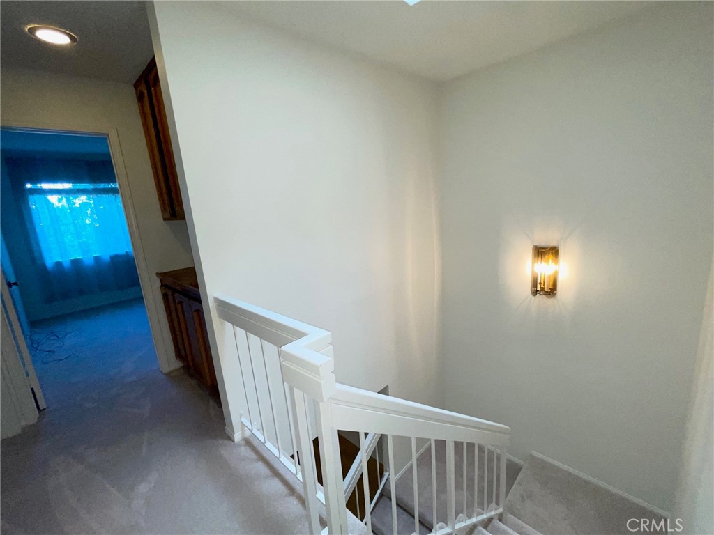 19500 Crystal Ridge Lane Porter Ranch, CA 91326 - Photo 13 of 33 a view of a livingroom with stairs