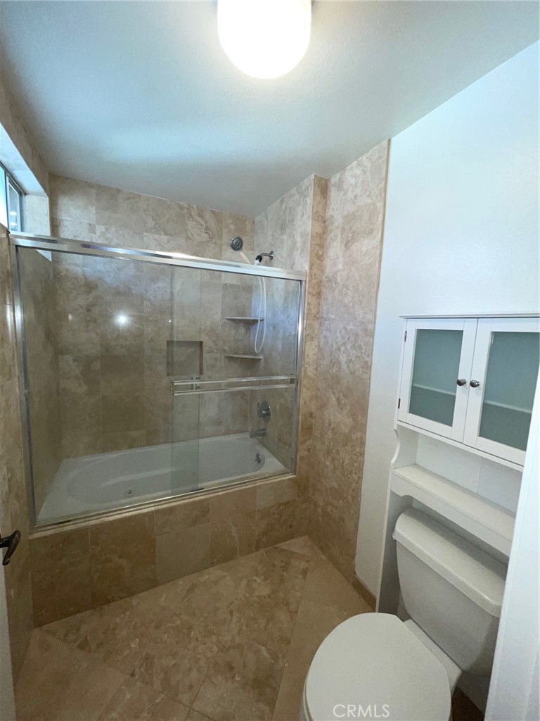 19500 Crystal Ridge Lane Porter Ranch, CA 91326 - Photo 22 of 33 a bathroom with a shower and toilet