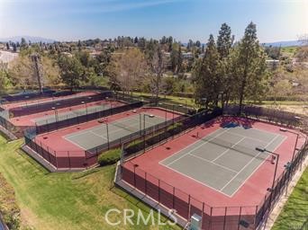 19500 Crystal Ridge Lane Porter Ranch, CA 91326 - Photo 27 of 33 a view of a tennis ground with large trees