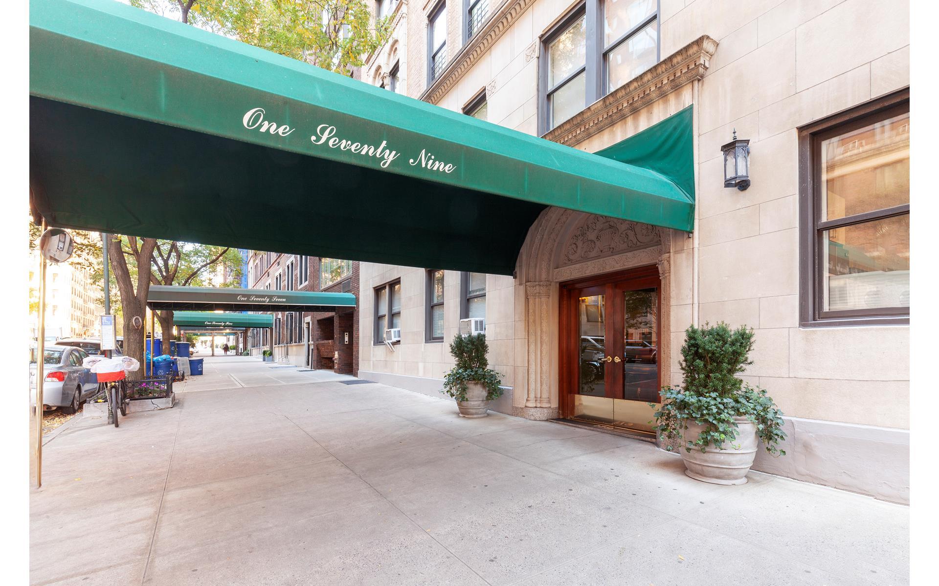 179 East 79th Street, Unit 4CD Manhattan, NY 10075 - Photo 11 of 14 a view of a building with sitting area
