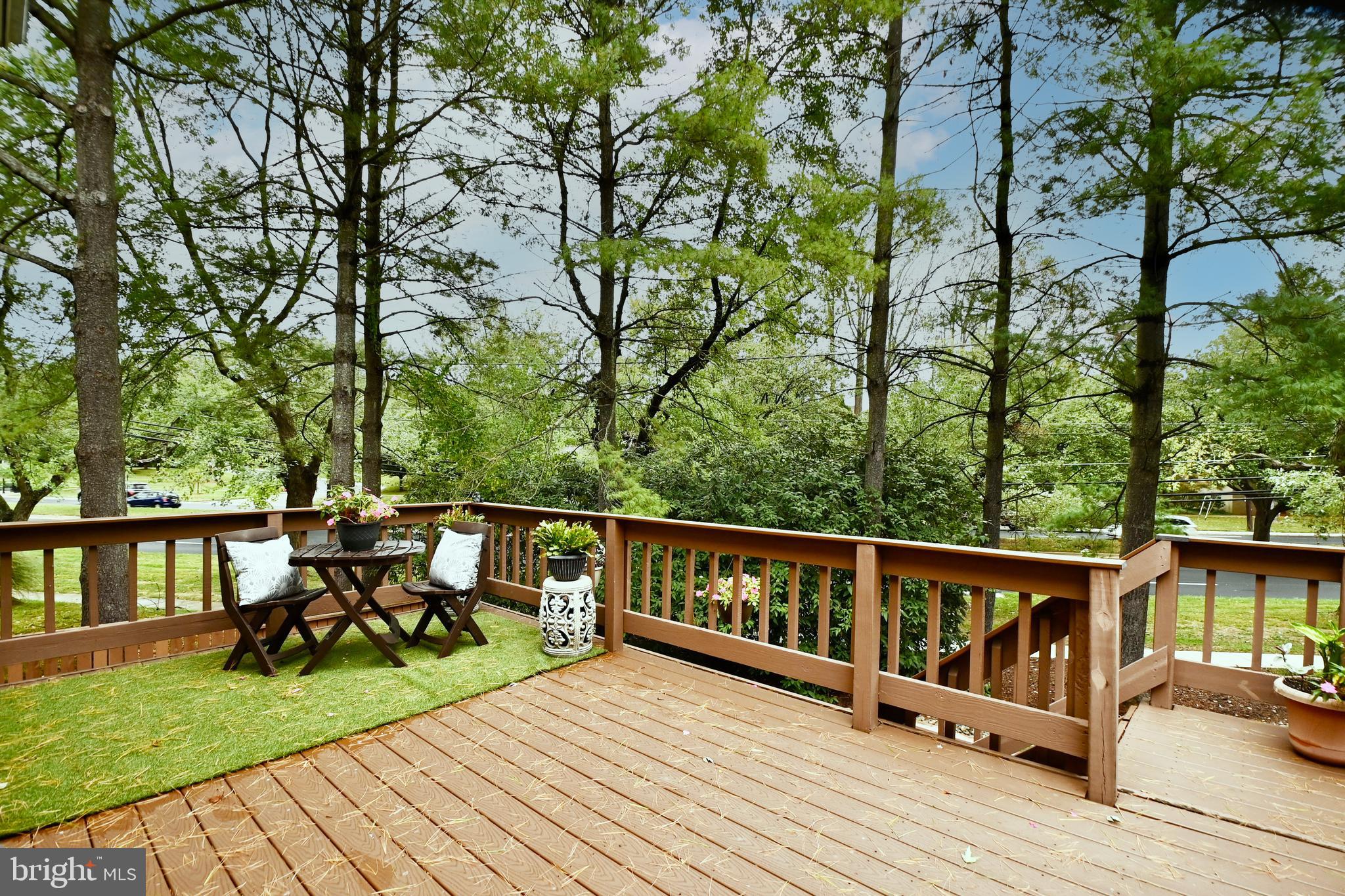 7443 Crestberry Lane Bethesda, MD 20817 - Photo 19 of 46 a view of deck with patio and yard