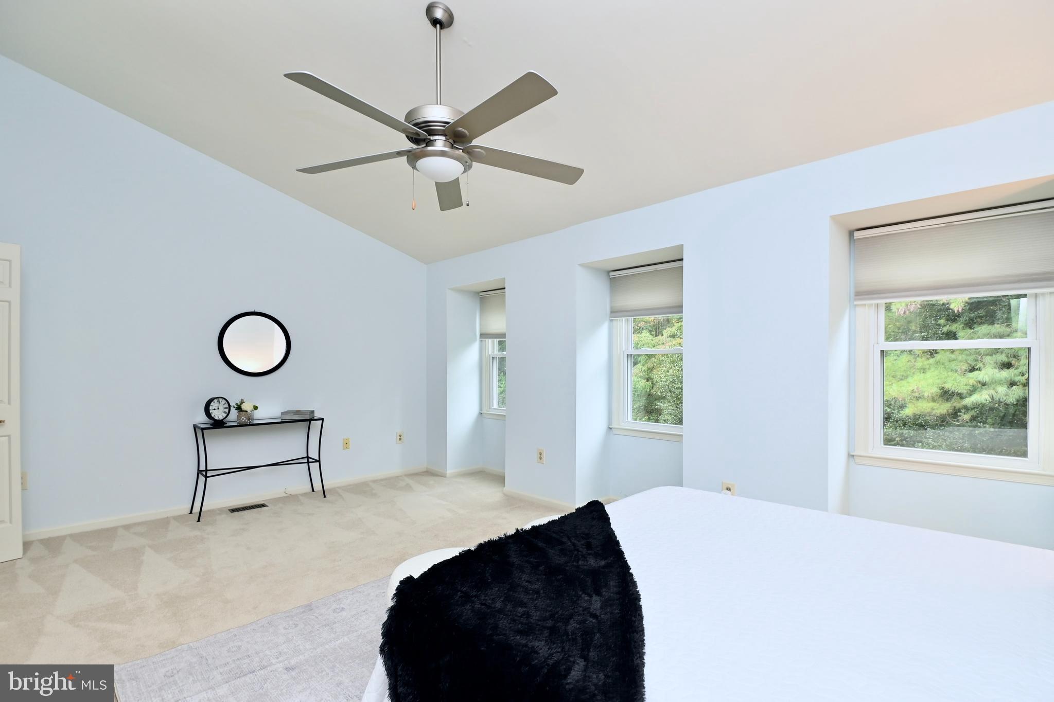 7443 Crestberry Lane Bethesda, MD 20817 - Photo 24 of 46 a bedroom with a bed and a window