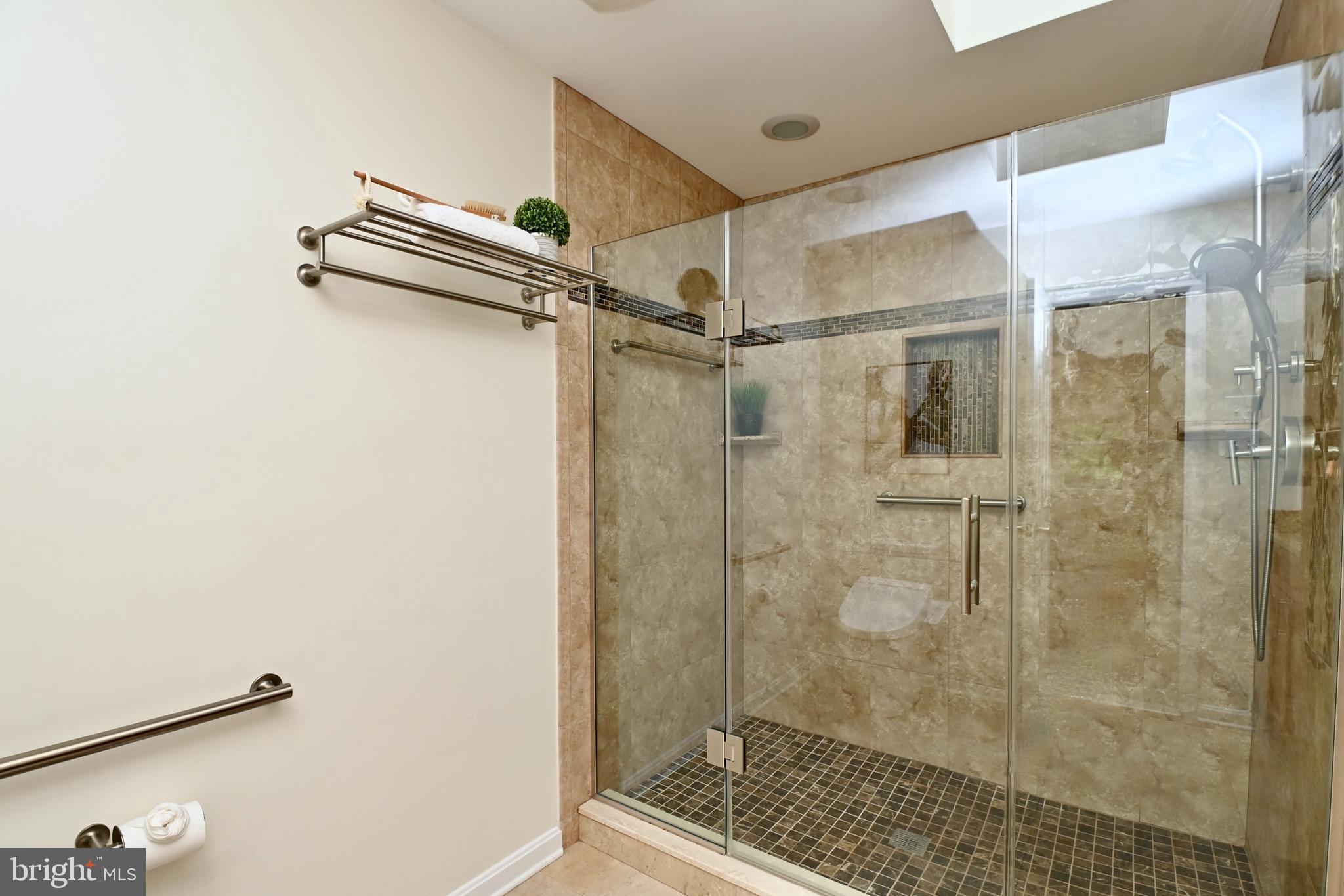 7443 Crestberry Lane Bethesda, MD 20817 - Photo 26 of 46 a bathroom with a shower