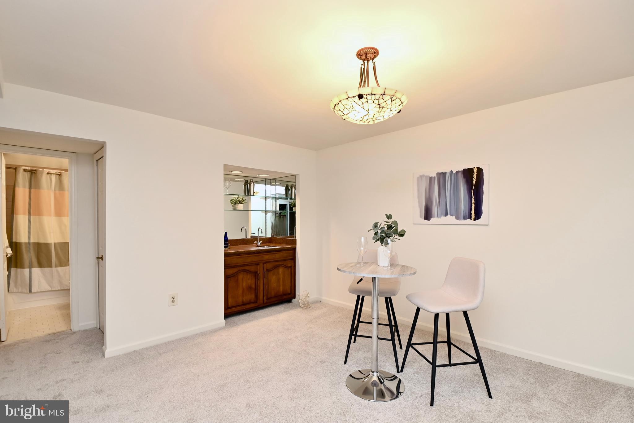 7443 Crestberry Lane Bethesda, MD 20817 - Photo 34 of 46 a view of a dining room with furniture