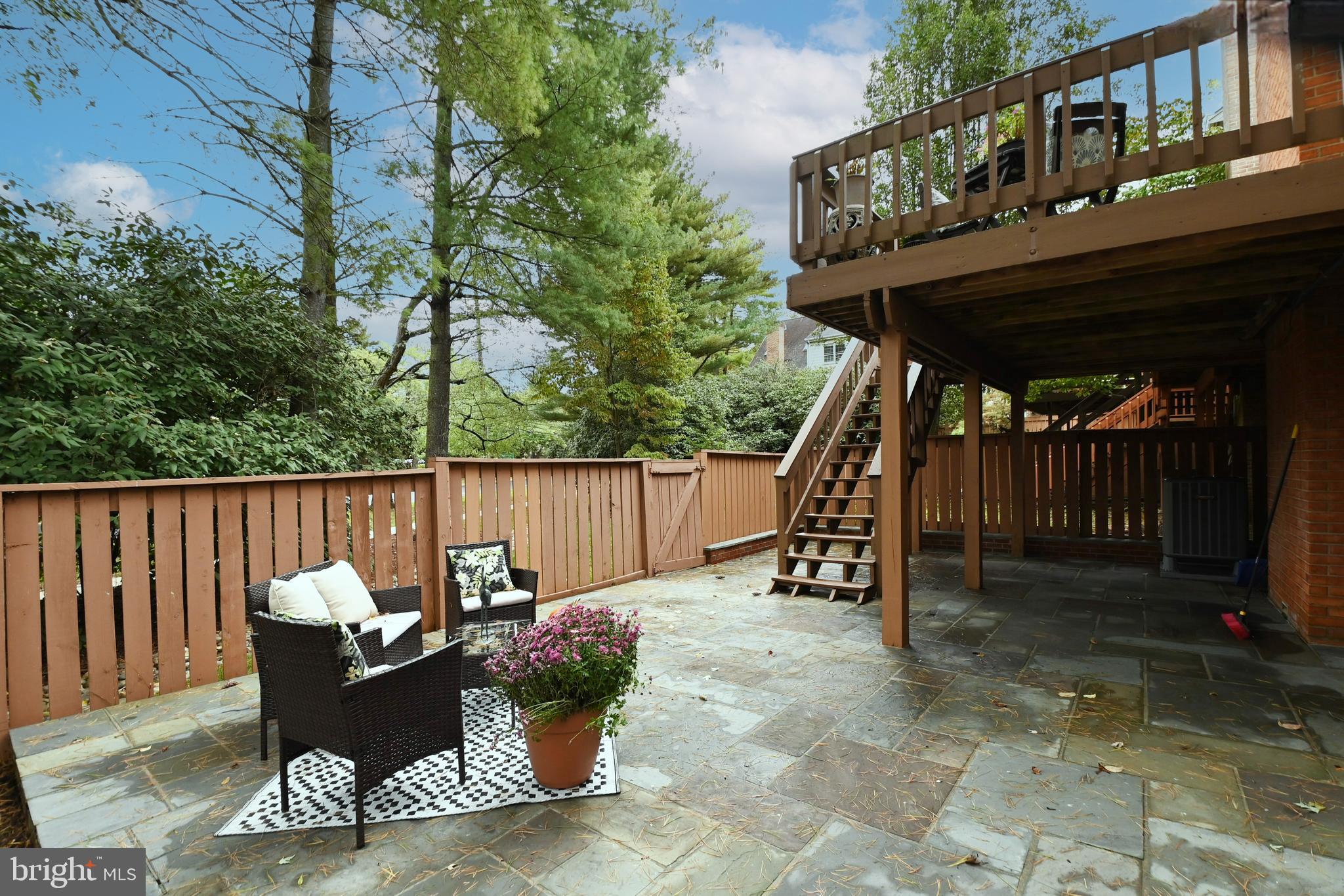 7443 Crestberry Lane Bethesda, MD 20817 - Photo 40 of 46 a view of a two chairs in the patio