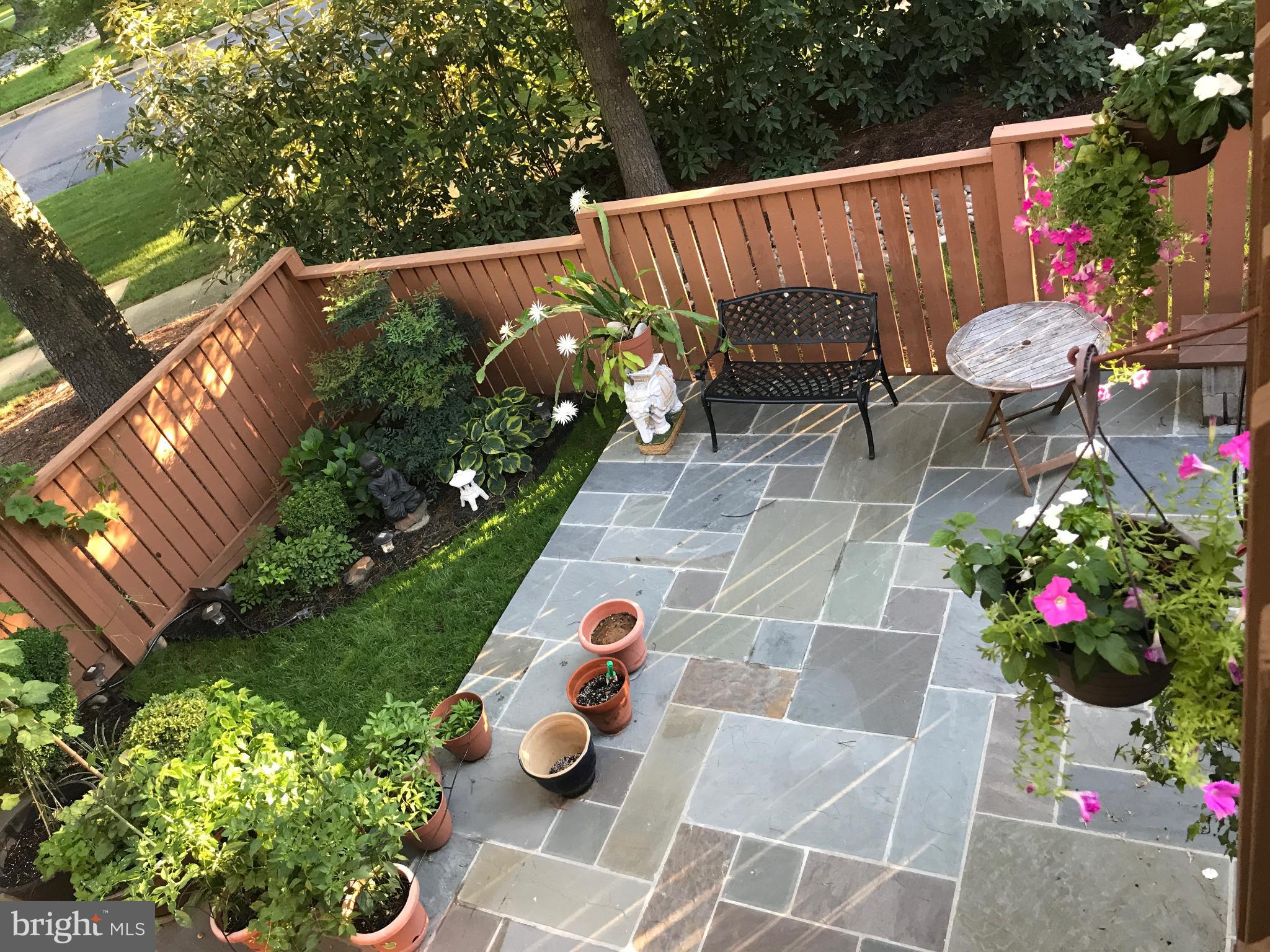7443 Crestberry Lane Bethesda, MD 20817 - Photo 42 of 46 a view of an outdoor sitting area with furniture