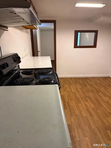 a view of a room with an empty space