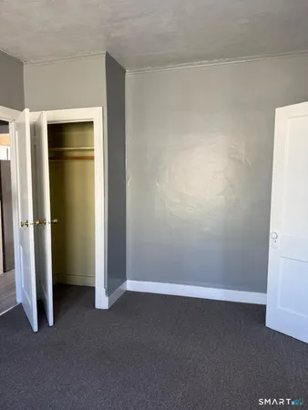 an empty room with closet