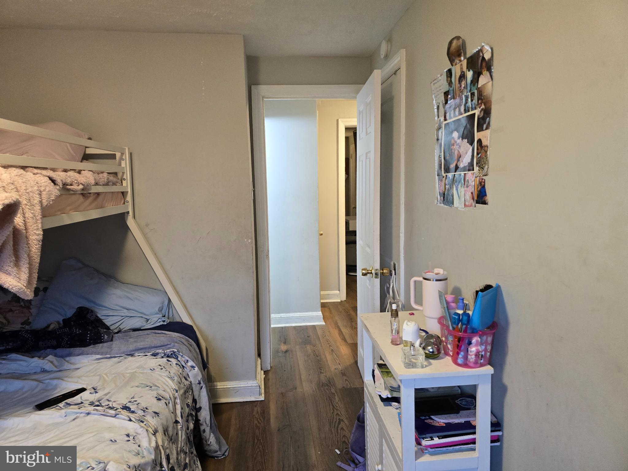 229 West 22nd Street Chester, PA 19013 - Photo 14 of 20 a bedroom with a bed and a tv