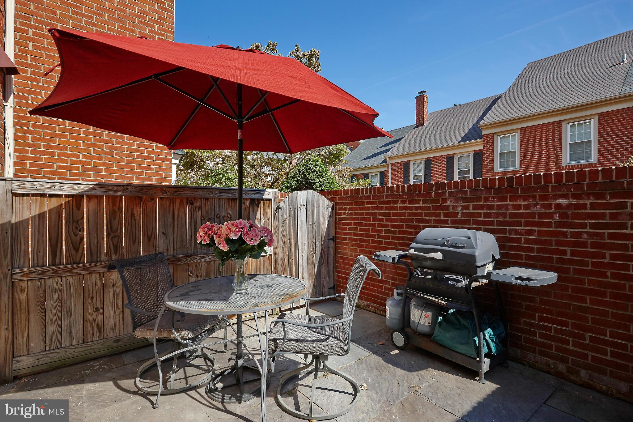 1235 Portner Road Alexandria, VA 22314 - Photo 16 of 25 a patio with table and chairs