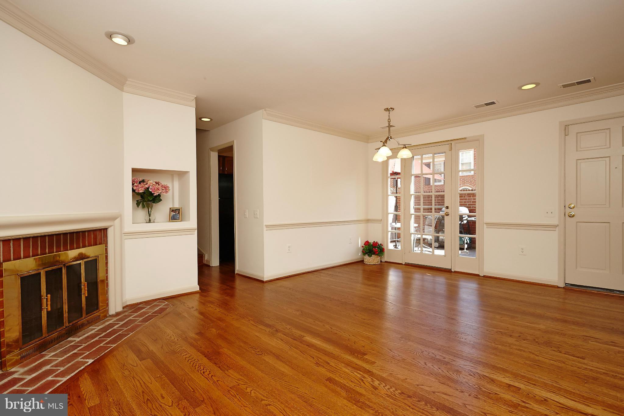 1235 Portner Road Alexandria, VA 22314 - Photo 6 of 25 a view of a livingroom with wooden floor