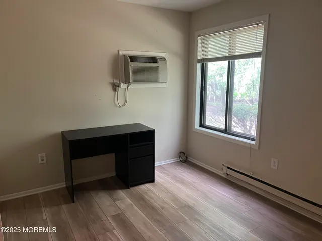 a room with a table and a window