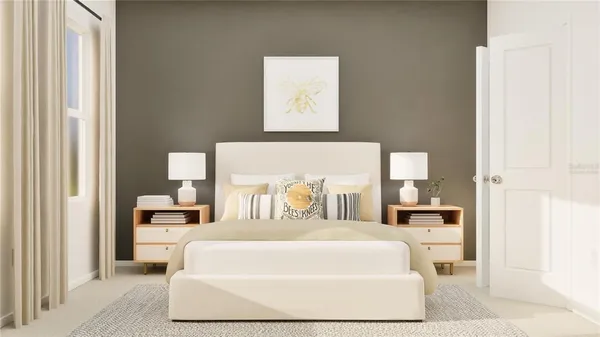 a large bed sitting in a bedroom next to a window