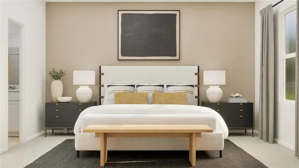 a bedroom with a bed and a table