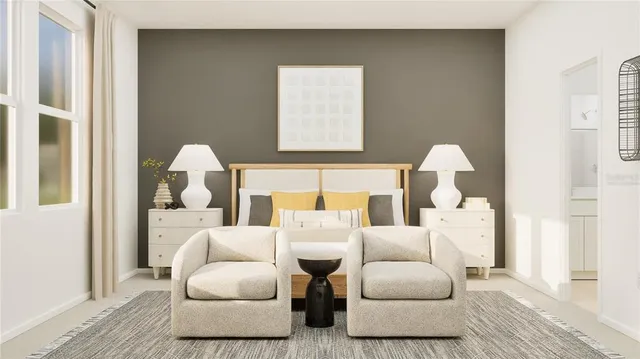 a living room with furniture and a window