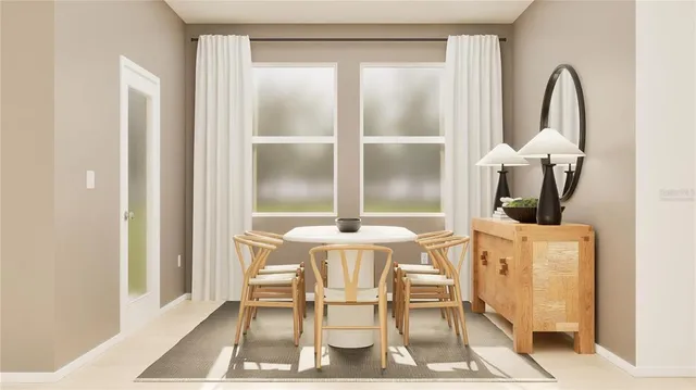 a dining room with furniture and a window