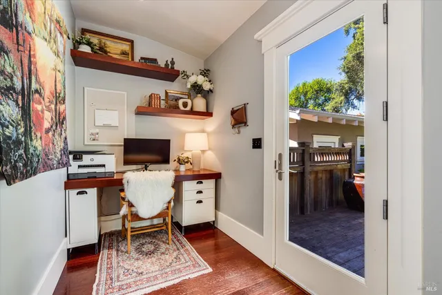 a workspace with furniture and a window