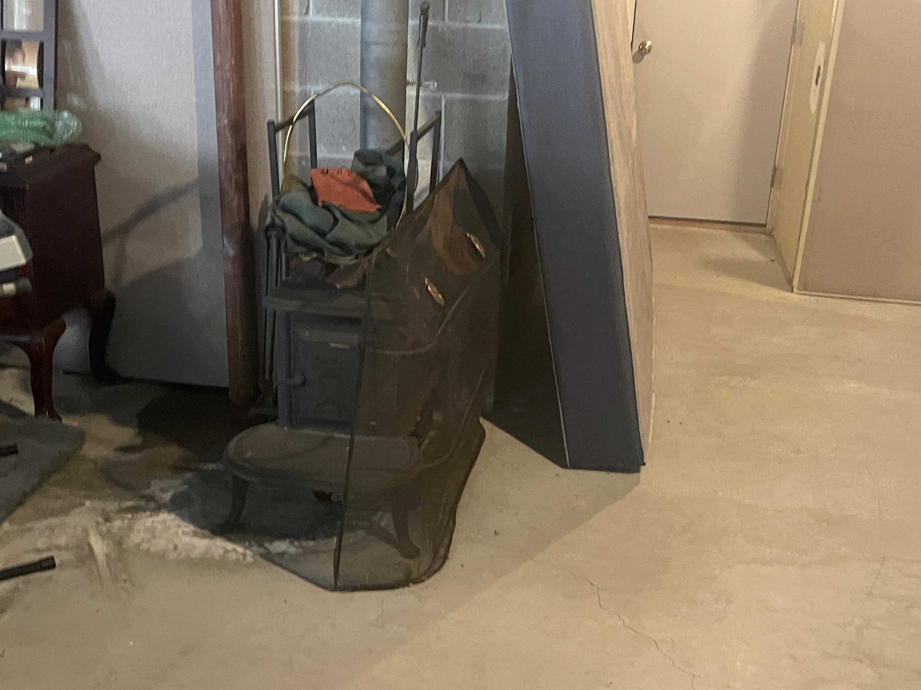 824 Meadow Road Casco, ME 04015 - Photo 28 of 36 Meadow Road Basement Woodstove