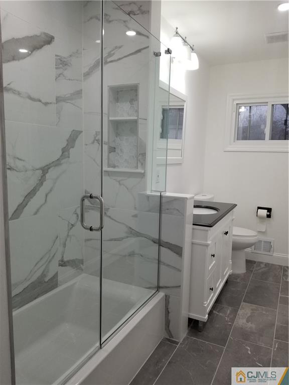 9 Yale Road Old Bridge, NJ 08859 - Photo 11 of 20 a bathroom with a bathtub and a shower