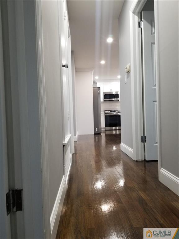 9 Yale Road Old Bridge, NJ 08859 - Photo 12 of 20 a view of a hallway view with wooden floor and seating space