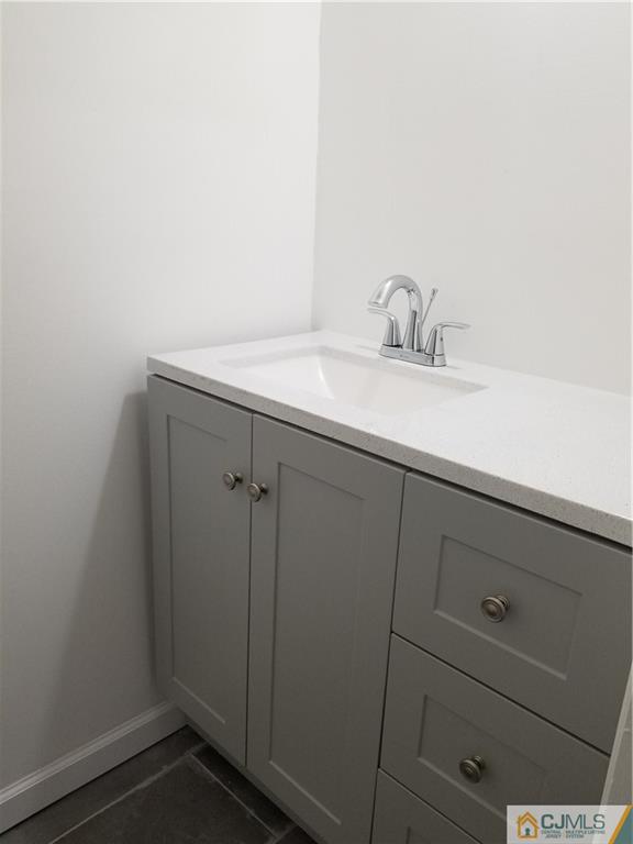 9 Yale Road Old Bridge, NJ 08859 - Photo 17 of 20 a bathroom with a sink and vanity