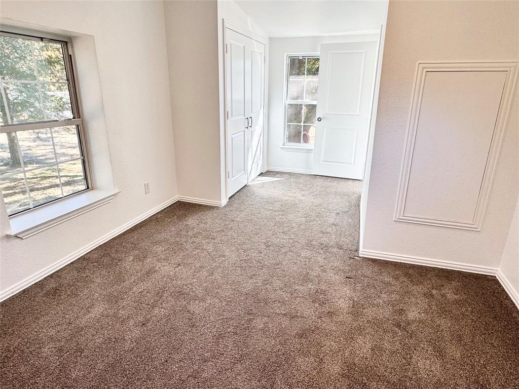 921 Bradleys Bend Tool, TX 75143 - Photo 19 of 29 an empty room with windows