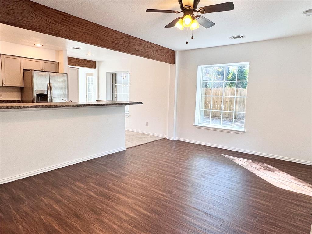 921 Bradleys Bend Tool, TX 75143 - Photo 2 of 29 a view of an empty room with wooden floor and a window