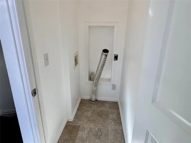 a view of road with large trees