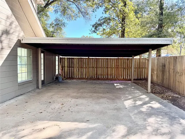 a view of a yard with trees