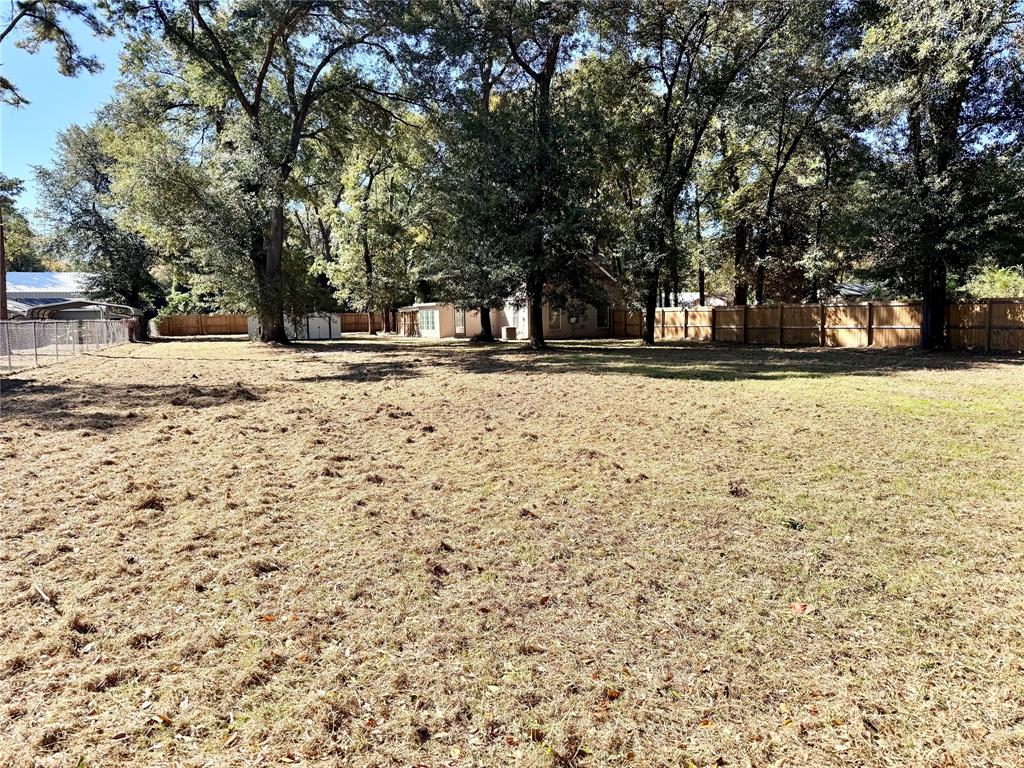921 Bradleys Bend Tool, TX 75143 - Photo 27 of 29 a view of a yard with trees