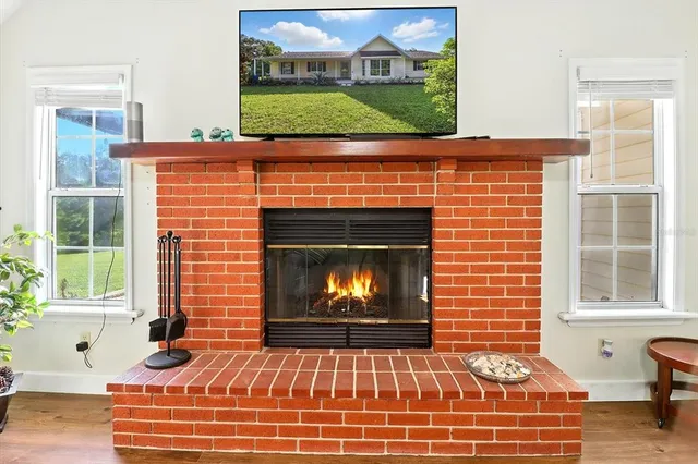 a brick building with a bench in front of it