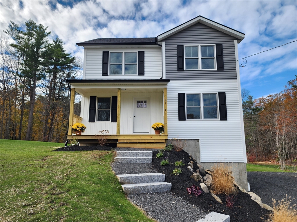 21 Cottage Street Winchendon, MA 01475 - Photo 11 of 12 a view of a house with a yard