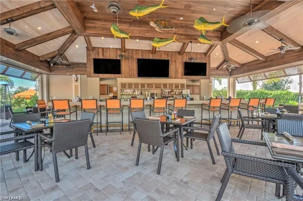 a dining space with lots of tables and chairs