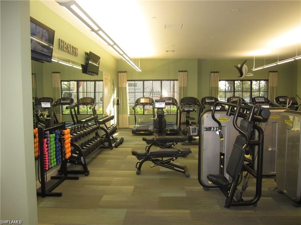 9377 Pocida Court, Unit 202 Naples, FL 34119 - Photo 30 of 30 a view of a room with gym equipment
