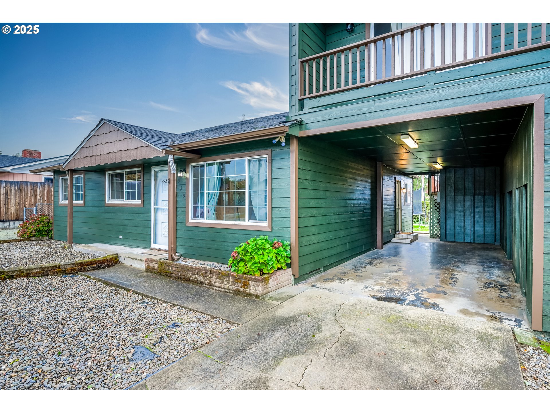 929 East 4th Avenue Riddle, OR 97469 - Photo 3 of 11 a view of a house with a porch