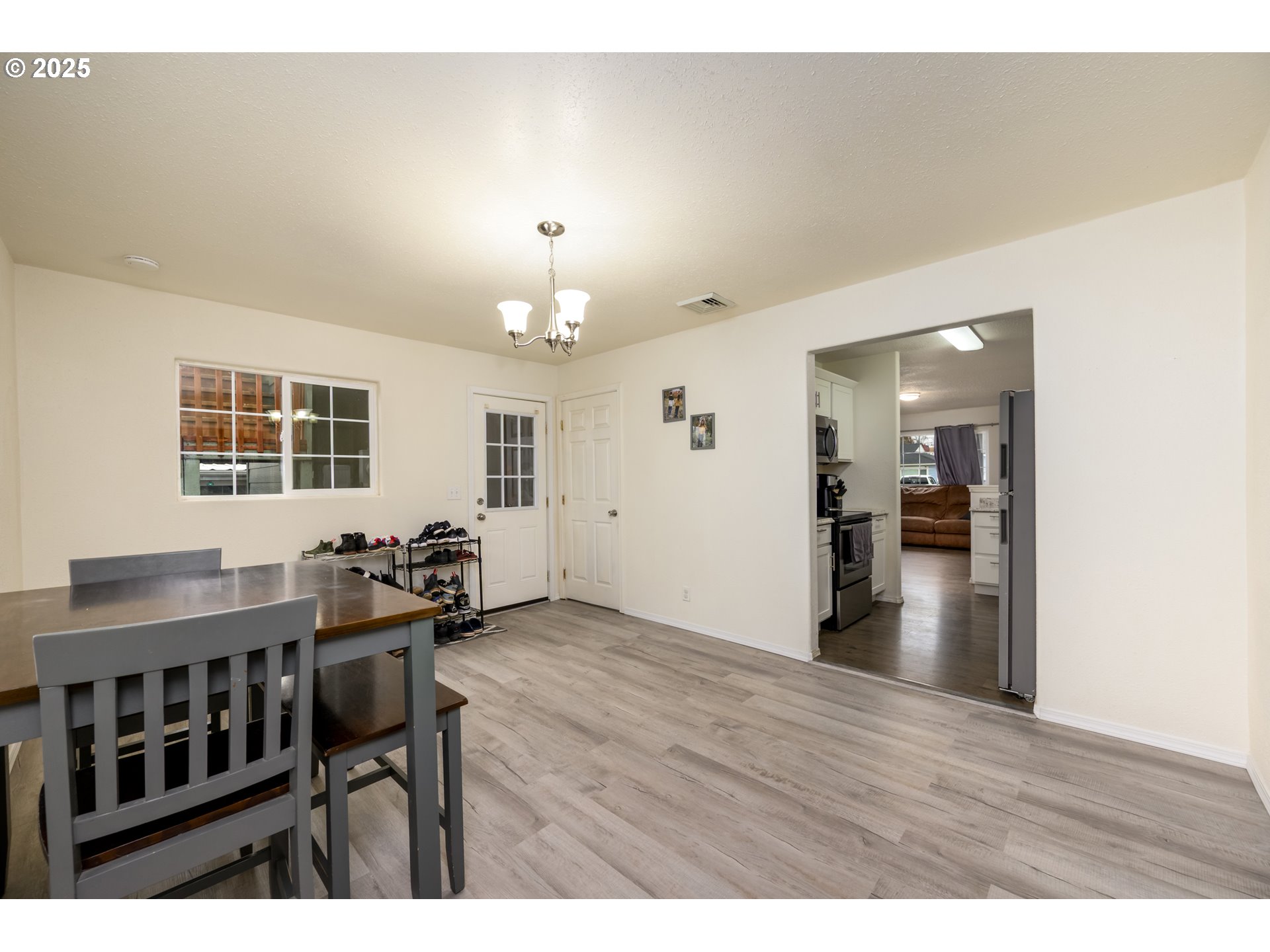 929 East 4th Avenue Riddle, OR 97469 - Photo 10 of 11 a view of a livingroom with furniture and wooden floor