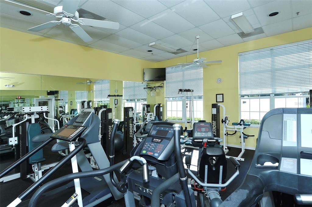 8370 Wingate Drive, Unit 718 Sarasota, FL 34238 - Photo 29 of 49 a view of a room with gym equipment