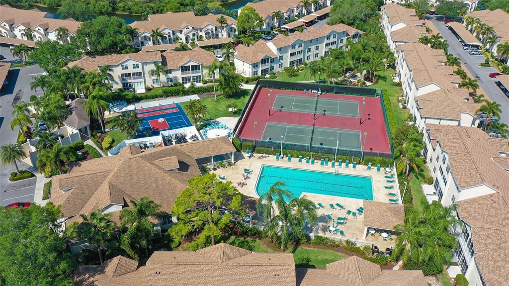 8370 Wingate Drive, Unit 718 Sarasota, FL 34238 - Photo 37 of 49 an aerial view of residential houses with outdoor space and street view