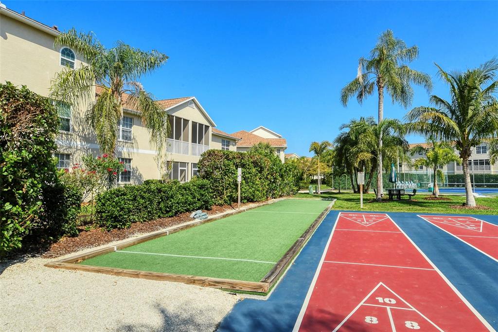 8370 Wingate Drive, Unit 718 Sarasota, FL 34238 - Photo 44 of 49 a view of outdoor space yard and swimming pool