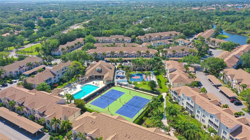8370 Wingate Drive, Unit 718 Sarasota, FL 34238 - Photo 48 of 49 an aerial view of a city with lots of residential buildings
