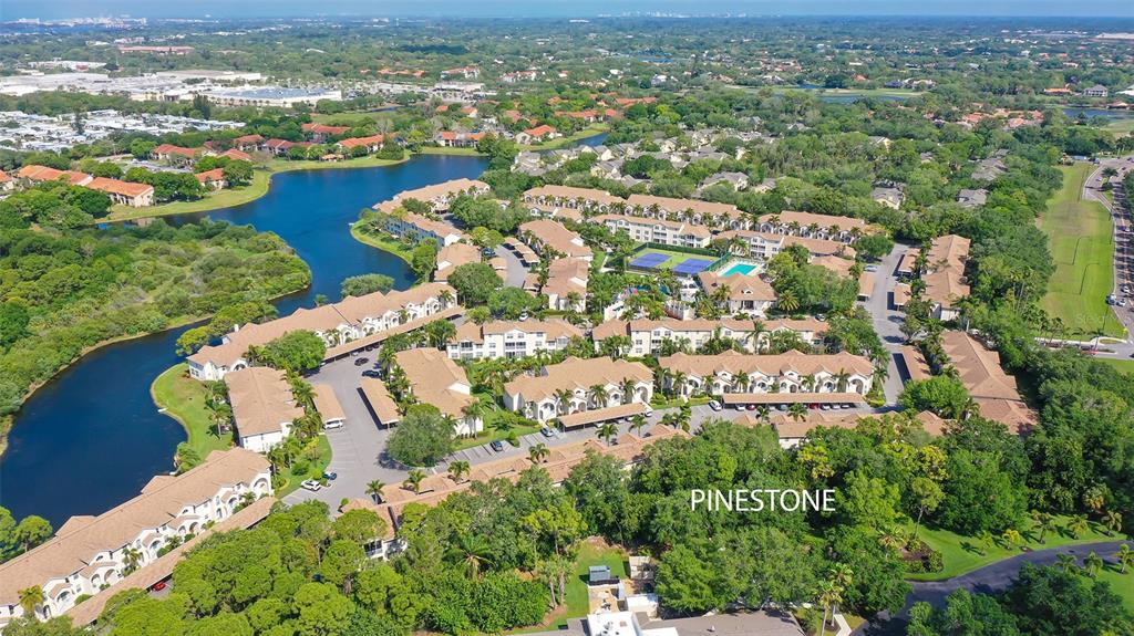 8370 Wingate Drive, Unit 718 Sarasota, FL 34238 - Photo 49 of 49 an aerial view of residential houses with outdoor space