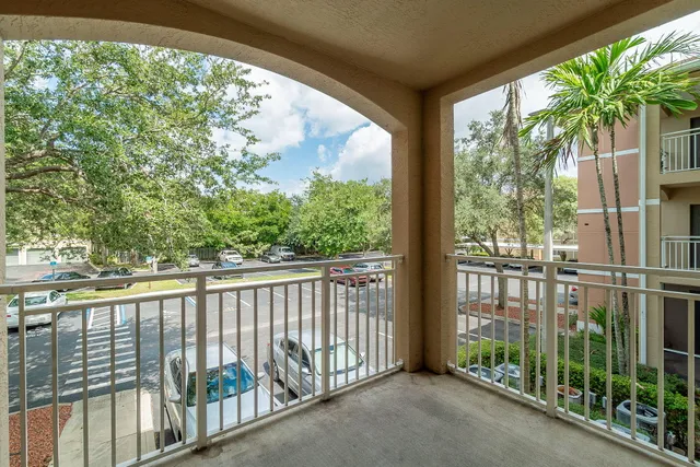 a view of a balcony with an outdoor space
