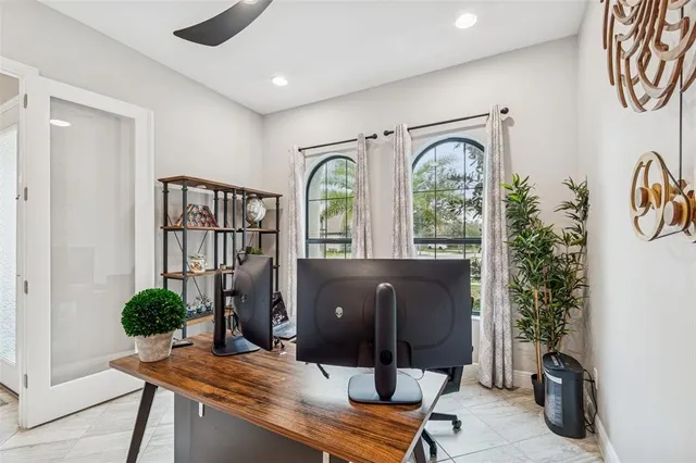 a bath tub sitting next to a shower