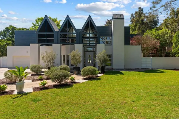a front view of a house having patio