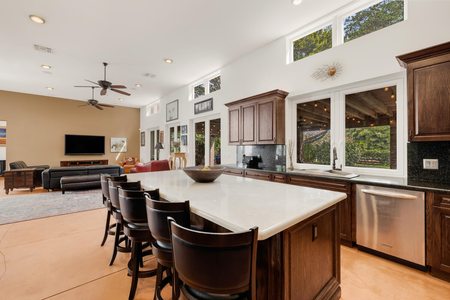12301 Southwest 107th Avenue Miami, FL 33176 - Photo 22 of 58 a kitchen with a stove a sink and a refrigerator